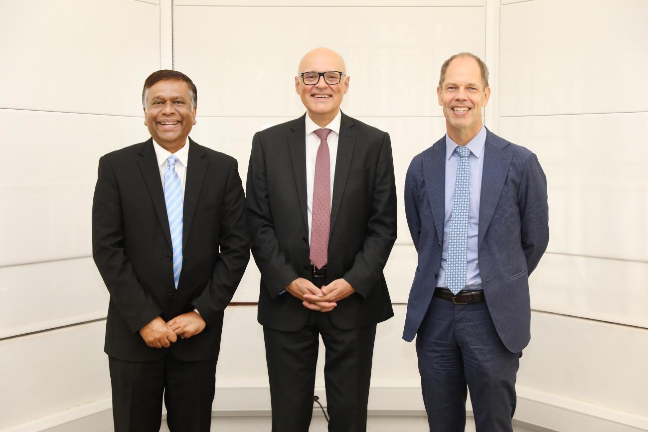 Abdur Rahim Siddiqui, Representative and Country Director, WFP Sri Lanka, Dr. Dominik Furgler, Ambassador of Switzerland to Sri Lanka and the Maldives and Christian Skoog, Representative, UNICEF Sri Lanka are standing from left to right. They are all wearing dark suits and smiling at the camera. 